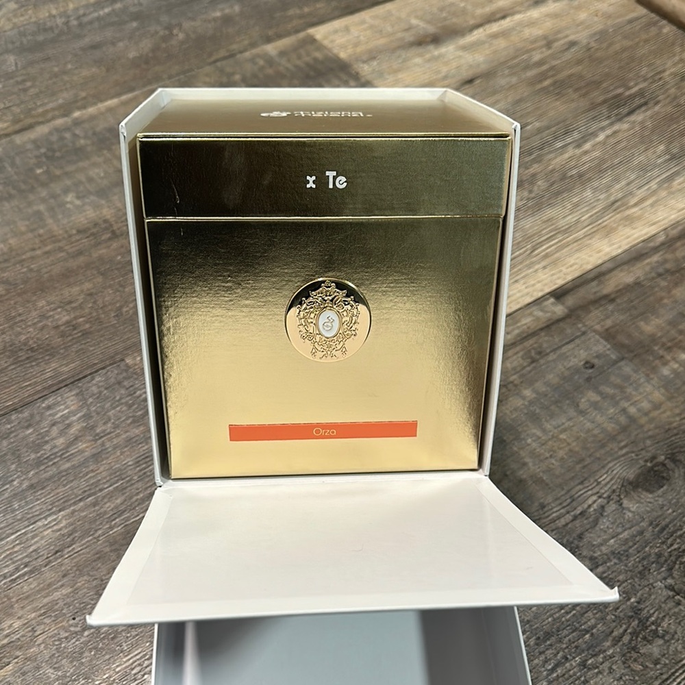 Gold and White Cube Accessory with Emblem